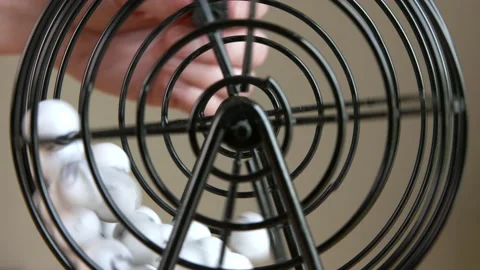 Lottery ball randomizer spinning with numbered lottery or Bingo balls Stock Footage 156865922