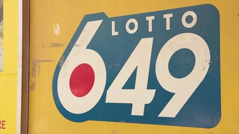 Lotto 649 big logo printed on yellow background outside outdoor exterior, blue Stock Footage 248249645