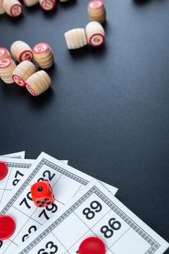 Lotto game on black background Stock Photos