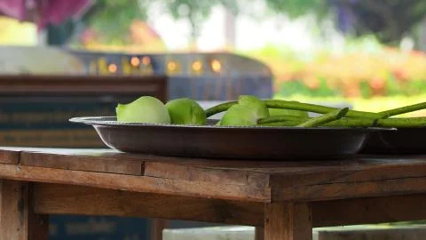 Lotus placed in pan On the table prepared for the worship of the Buddha.The b Stock Photos