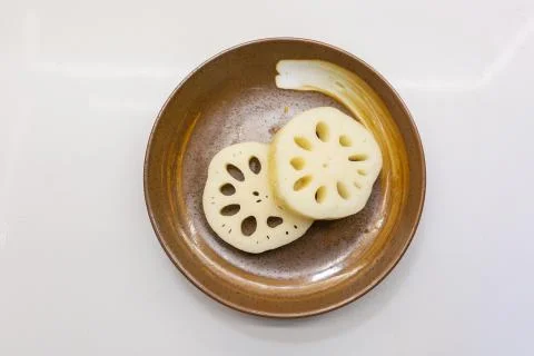 Lotus root on the plate Stock Photos