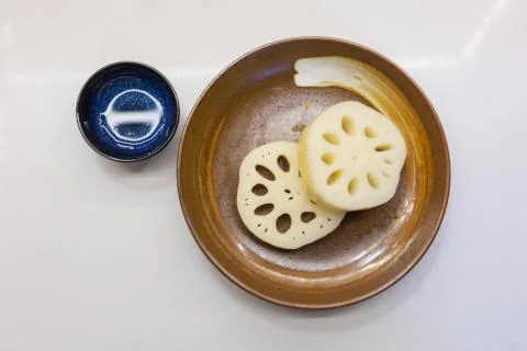 Lotus root on the plate Stock Photos