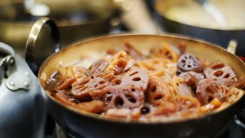 Lotus root soup with spices and herbs Stock Footage 75336797