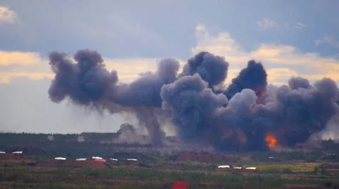 Loud explosions from artillery barrage  on the range on military exercises Stock Footage