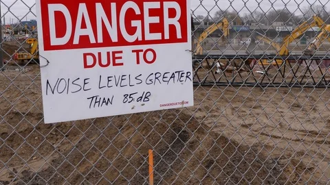 Loud noise warning signs at construction site Stock Footage 86303717