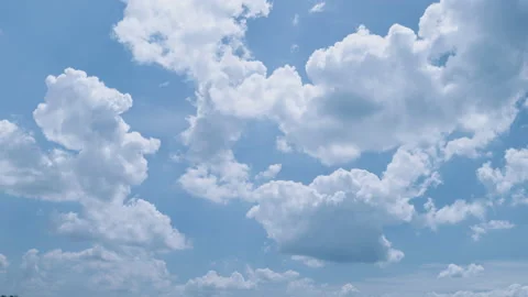 Louds floating in the sky.Blue sky white clouds. Puffy fluffy white clouds Stock Footage 155693048