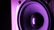 Loudspeaker In Action. Moving Sub-Woofer On Studio Speaker. Violet Neon Light Stock Footage