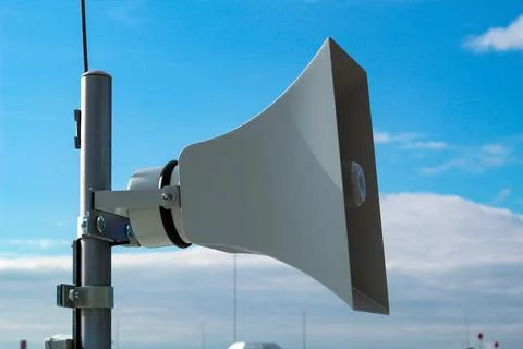 Loudspeaker of the emergency warning system against the background of a blue  Stock Photos