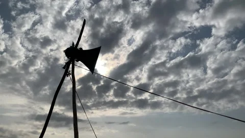Loudspeaker mounted on pole under dramatic cloudy sky Stock Footage 311453515