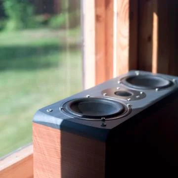 Loudspeaker placed on the window Fotos Stock