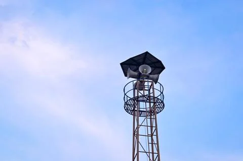 A loudspeaker for prayers outside the mosque at sunset Stock Photos