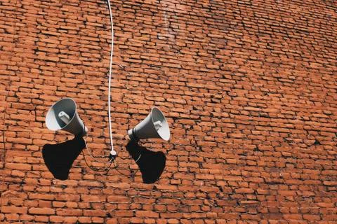 Loudspeakers on wall. Stock Photos