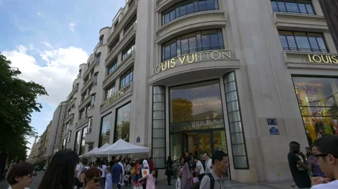 Louis Vuitton Store On Avenue Des Champselysees And People Waiting
