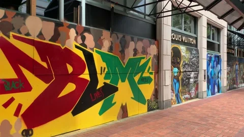 Louis Vuitton storefront graffiti in support of black lives matter movement. Видео 138848335