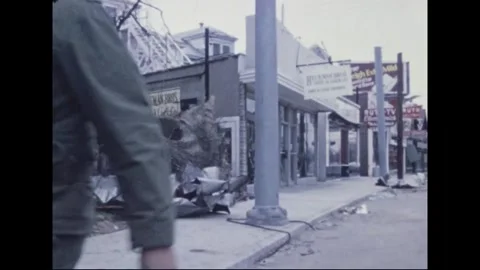 LOUISVILLE - 1974: Tornado Aftermath — Empty storefront beneath uprooted tree Stock Footage 342230514