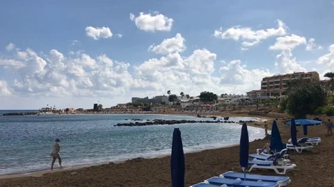 Louma Beach vs Saint Nicholas Chapel in Protaras Stock Footage 90659129