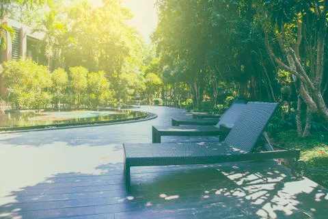Lounge chairs by the pool Stock Photos