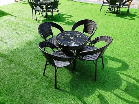 Lounge chairs in the yard Stock Photos