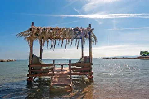 Lounges on the beach Stock Photos