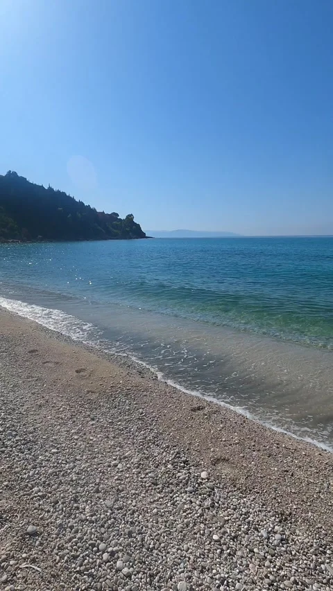 Lourdas Beach with Calm Waters in Summer Kefalonia Greece Stock Footage 345371475