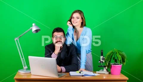 Love affair at work. Seduction. businessman and assistant solve problem. woman Stock Photos