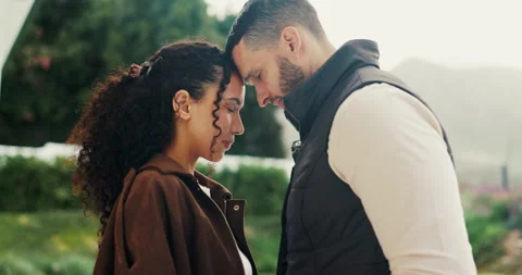Love, affection and couple in park for bonding, support and commitment on Stock Footage 335266476
