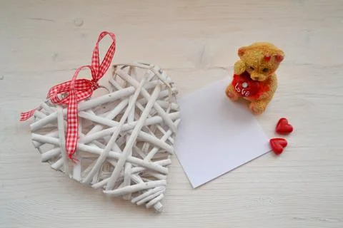 Love card for concept design in rustic style. Heart with teddy for copyspace. Stock Photos