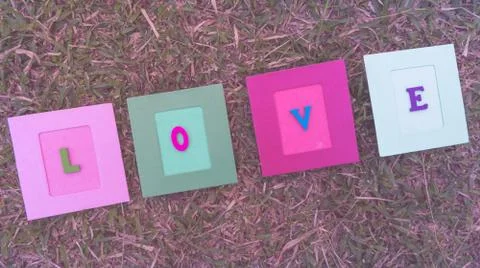 Love card put on grass Stock Photos
