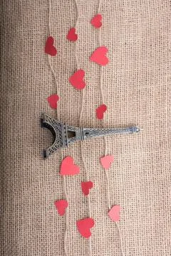 Love concept with Eiffel tower and paper heart on threads 스톡 사진
