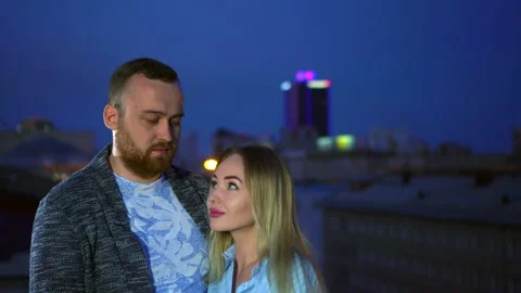 Love couple looking face to face enjoy lighting night city beautiful dating 4K. Stock Footage 138244744