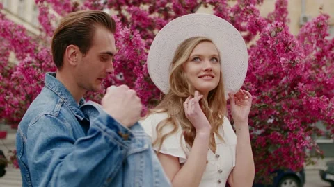 Love dates care conception. Young happy smiling fashionable couple posing near Stock Footage 130379196