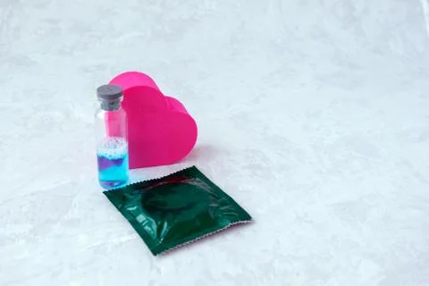 Love elixir, magic potion-a bubble of blue liquid-new science of sex selectio Stock Photos