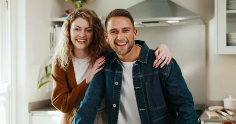 Love, face and couple in kitchen with laugh, partner loyalty and bonding Stock Footage 341101624
