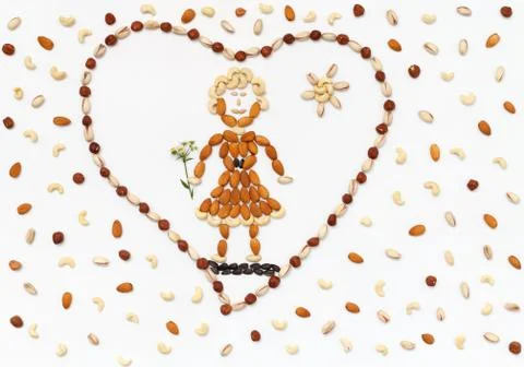 Love gift, composition of tropical nuts. Stock Photos