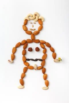 Love gift, composition of tropical nuts. Stock Photos