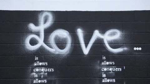 Love Graffiti on Side of Building (Gritty Urban Street Art)  Video stock 219374307