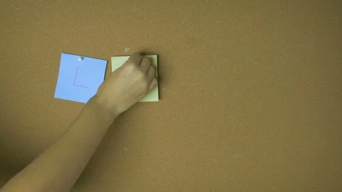 Love. Hands pining sticky notes on pin board funny animation Stock-Footage 98844660