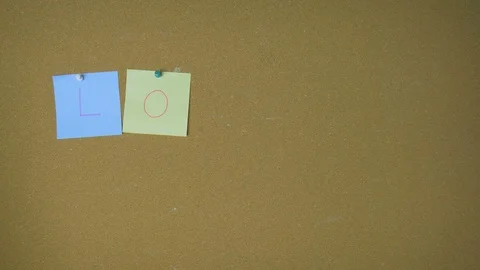 Love. Hands pining sticky notes on pin board funny animation Stock Footage 98846667