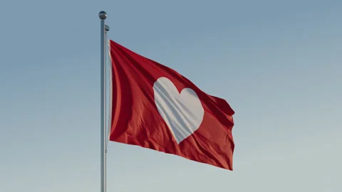 Love Heart Flag: Cinematic Loopable Motion with Blue Sky in 4K ProRes 444 HQ Stock Footage 269823358