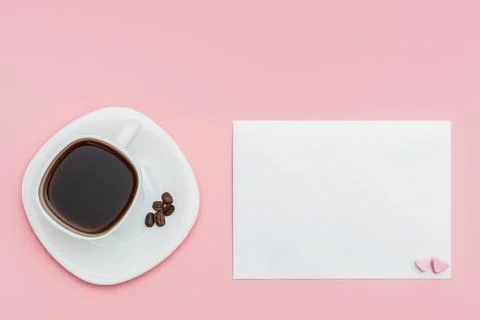 Love letter and white cup of coffee. pearlescent envelope Stock Photos
