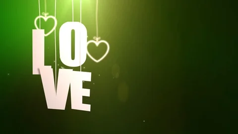 LOVE letters hanging on string falling from the ceiling with green backgound Stock Footage 105960733