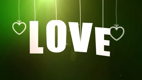 LOVE letters hanging on string falling from the ceiling with green backgound 스톡 동영상 105987049