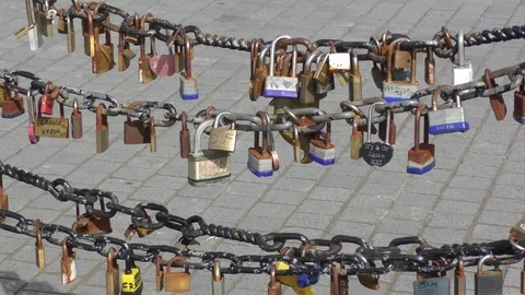 Love lock padlocks swinging on chain Stock Footage 74470347
