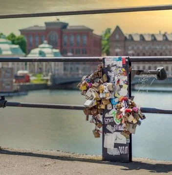 Love locks attached by lovers to the railing of Riksbron Bridge, or The National Stock Photos