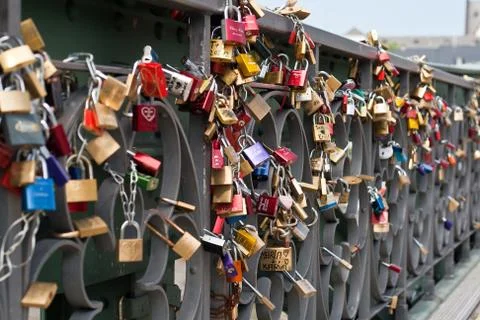 Love locks in a bridge Stock Photos