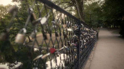 Love Locks on Bridge at Sunset Stock Footage 94412020