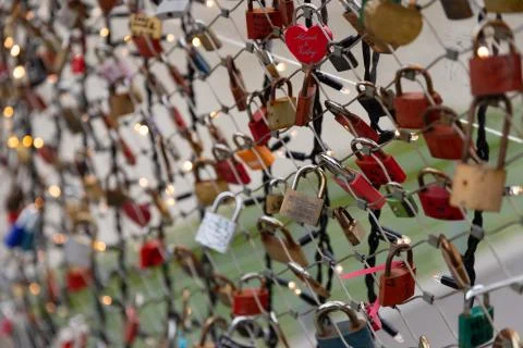Love locks (padlocks) in a bridge over Salzach river in Salzburg, Austria Stock Photos