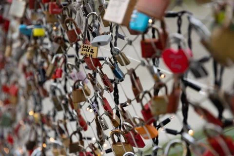 Love locks (padlocks) in a bridge over Salzach river in Salzburg, Austria Stock Photos
