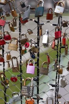 Love locks (padlocks) in a bridge over Salzach river in Salzburg, Austria Stock Photos
