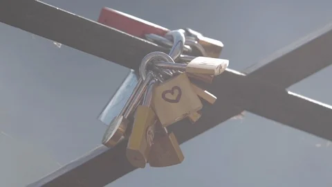 Love locks padlocks on the love bridge, Pont des Arts, in Paris during a sunny 스톡 동영상 110692920